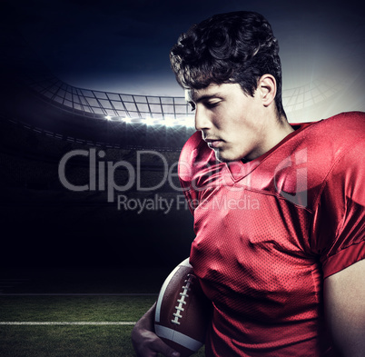 Composite image of american football player holding ball while e