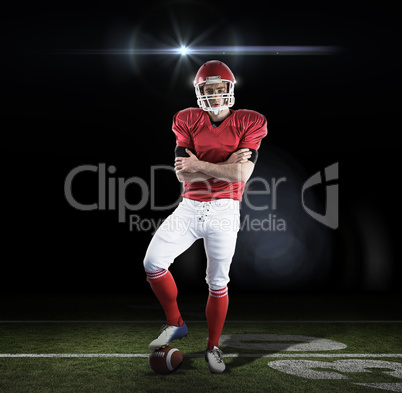 Composite image of portrait of american football player with arm