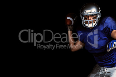 Composite image of american football player in uniform throwing ball
