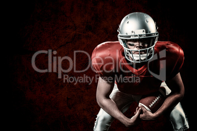 Composite image of portrait of american football player bending Composite image of portrait of american football player bending