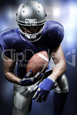 Composite image of american football player holding ball while k