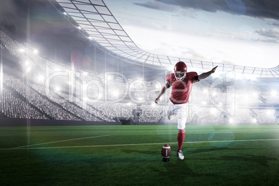 Composite image of american football player kicking football