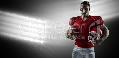 Composite image of american football player looking at camera