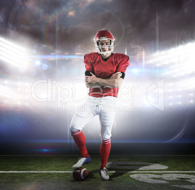 Composite image of portrait of american football player with arm