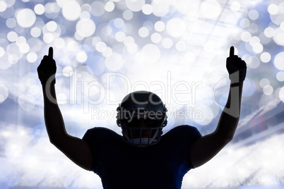 Composite image of silhouette american football player with thum