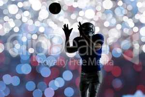 Composite image of american football player catching ball