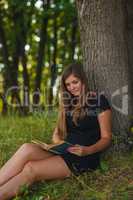 Girl European appearance young brown-haired woman in a black dre