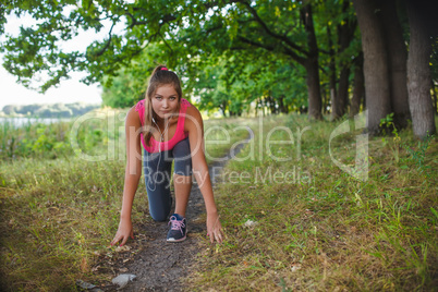 Girl European appearance young brown-haired woman in a pink shir