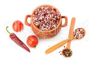 beans in a ceramic pot isolated on white background