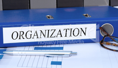 Organization - blue binder in the office