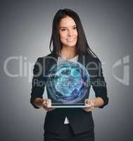 Young girl holding tablet in the hands of virtual digital world globe