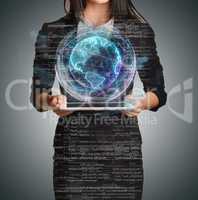 Young girl holding tablet in hands of virtual digital globe and computer code
