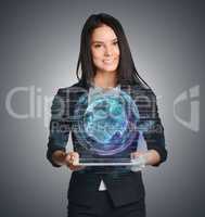 Young girl holding tablet in hands of virtual digital globe and computer code