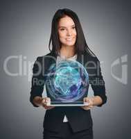 Close up Girl holding a digital globe over tablet
