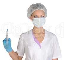 Doctor a masked holds before him syringe in hand