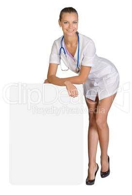 Woman is doctor resting his hands on an empty billboard