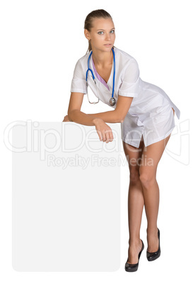 Woman is doctor resting his hands on an empty billboard