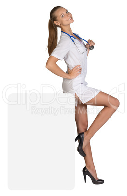 Woman doctor sits on an empty billboards