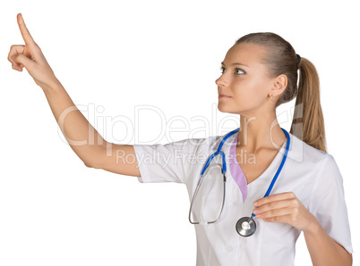 Healthcare. Female doctor pointing to something or pressing imaginary button