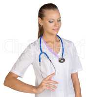Healthcare. The woman in white coat. Smiling female doctor pointing to something or pressing imaginary button