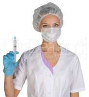 Woman doctor in robe holding blank medical syringe