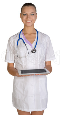 Woman doctor holding a tablet. Isolated on white background