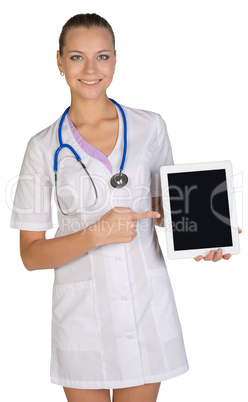 Woman doctor holding a tablet showing forefinger on the screen