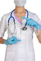 Doctor with stethoscope holding blank medical syringe