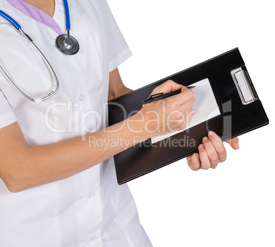 Doctor writes prescription treatment on the clipboard