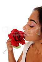Portrait of african american woman with rose.