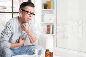 Mature Asian man throat pain