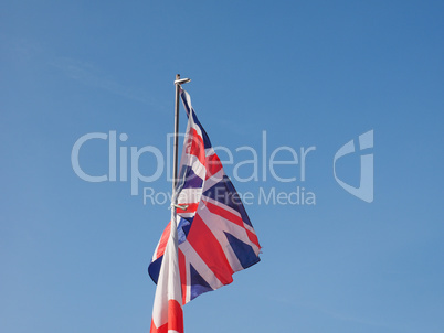 Flag of UK over blue sky