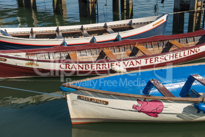 Colored rowing boats in a harbor