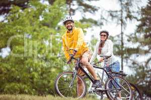 Happy couple on a bike ride