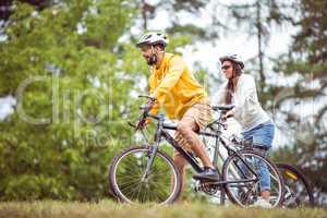 Happy couple on a bike ride