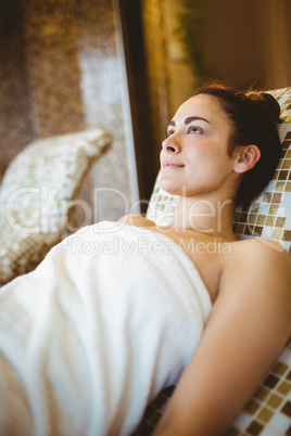 Woman relaxing while lying down Woman relaxing while lying down