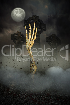 Skeleton hand bursting from the grave