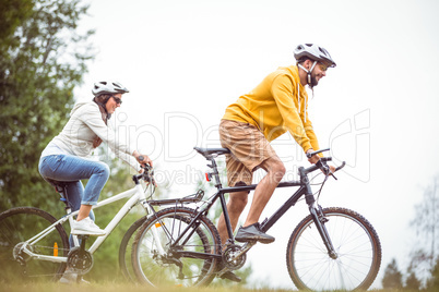 Happy couple on a bike ride