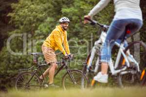 Happy couple on a bike ride