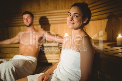 Happy couple enjoying the sauna together