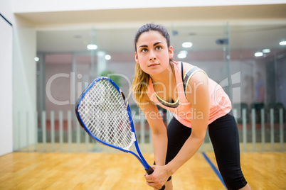 Woman eager to play squash