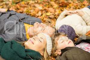 Young family doing a head circles