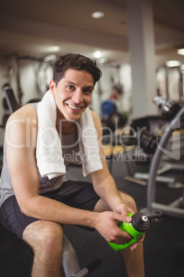 Fit man taking a break from working out