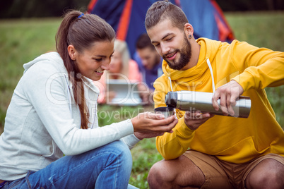 Happy friends on a camping trip