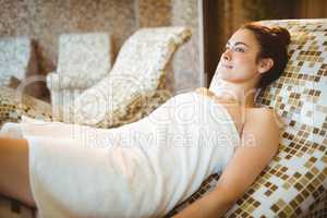Woman relaxing while lying down