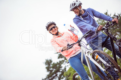 Happy couple on a bike ride