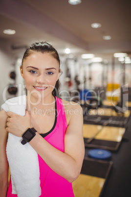 Fit woman smiling at camera