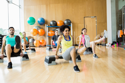 Fitness class exercising in the studio