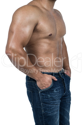 Muscular man wearing blue jeans