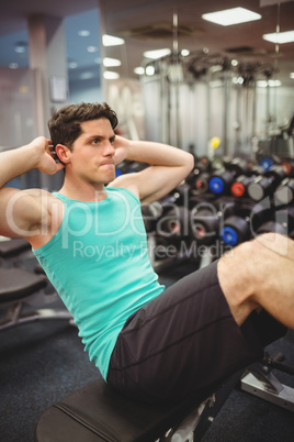 Fit man doing sit ups